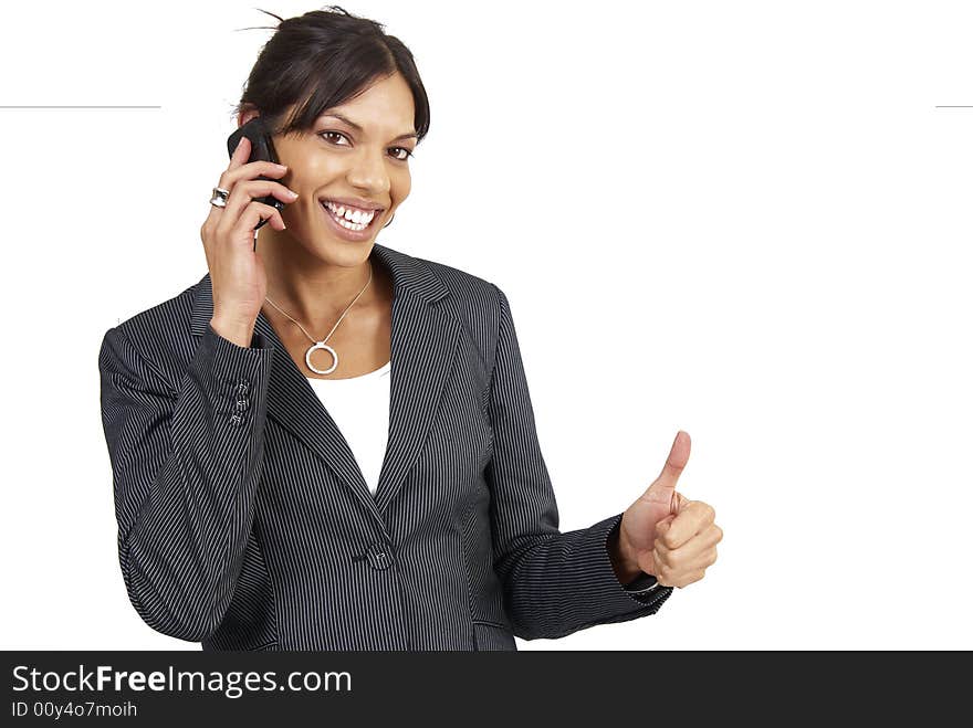 Beautiful brunette woman in pinstripe suit giving a thumbs up. Isolated on white background with copy space. Beautiful brunette woman in pinstripe suit giving a thumbs up. Isolated on white background with copy space