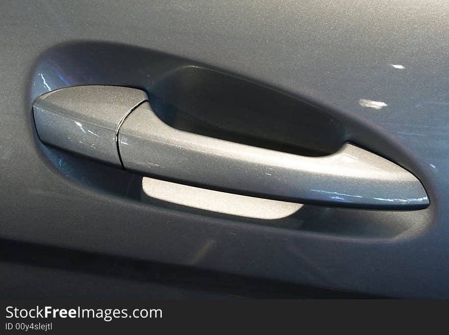 Grey car door with door handle. Grey car door with door handle