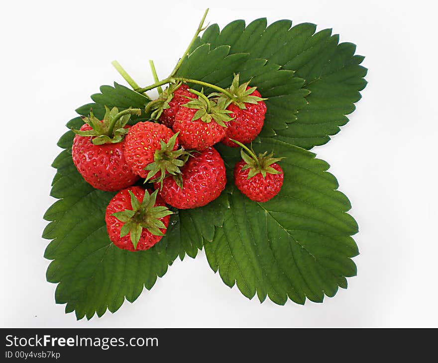 Juicy red strawberries isolated on white background