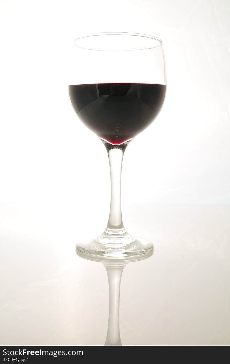 Glass of Red Wine on white background