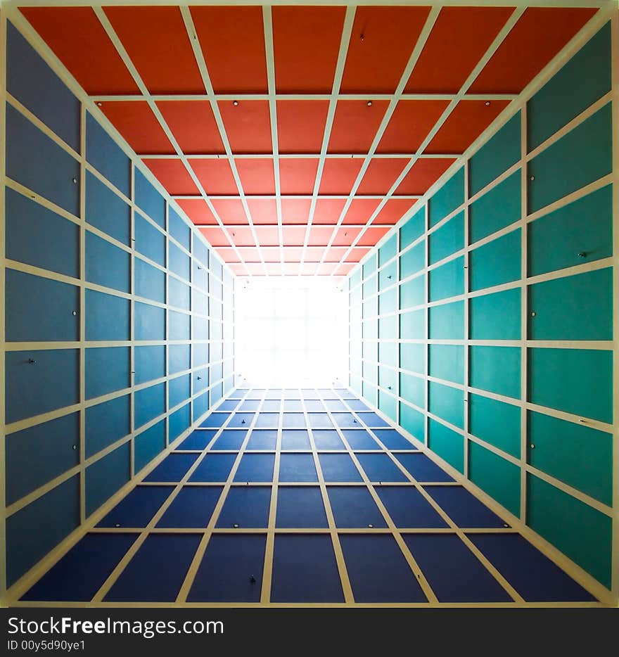 Tapering pyramid ceiling with skylight in the interior of a modern building