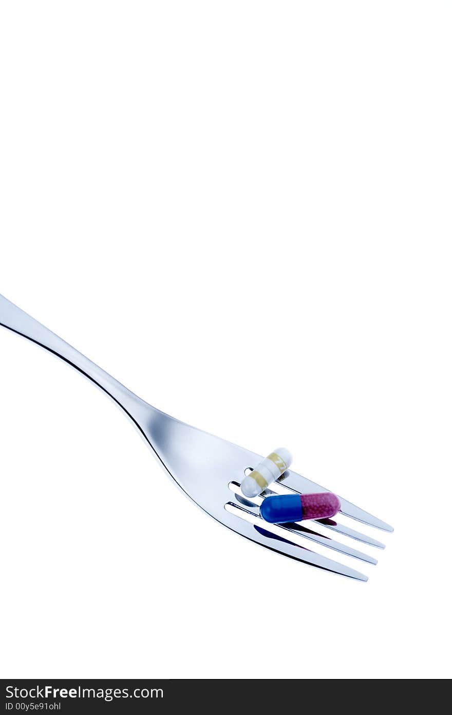 Pills and fork