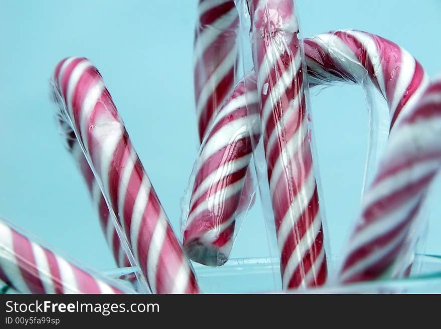 Candy Canes Isolated on Blue