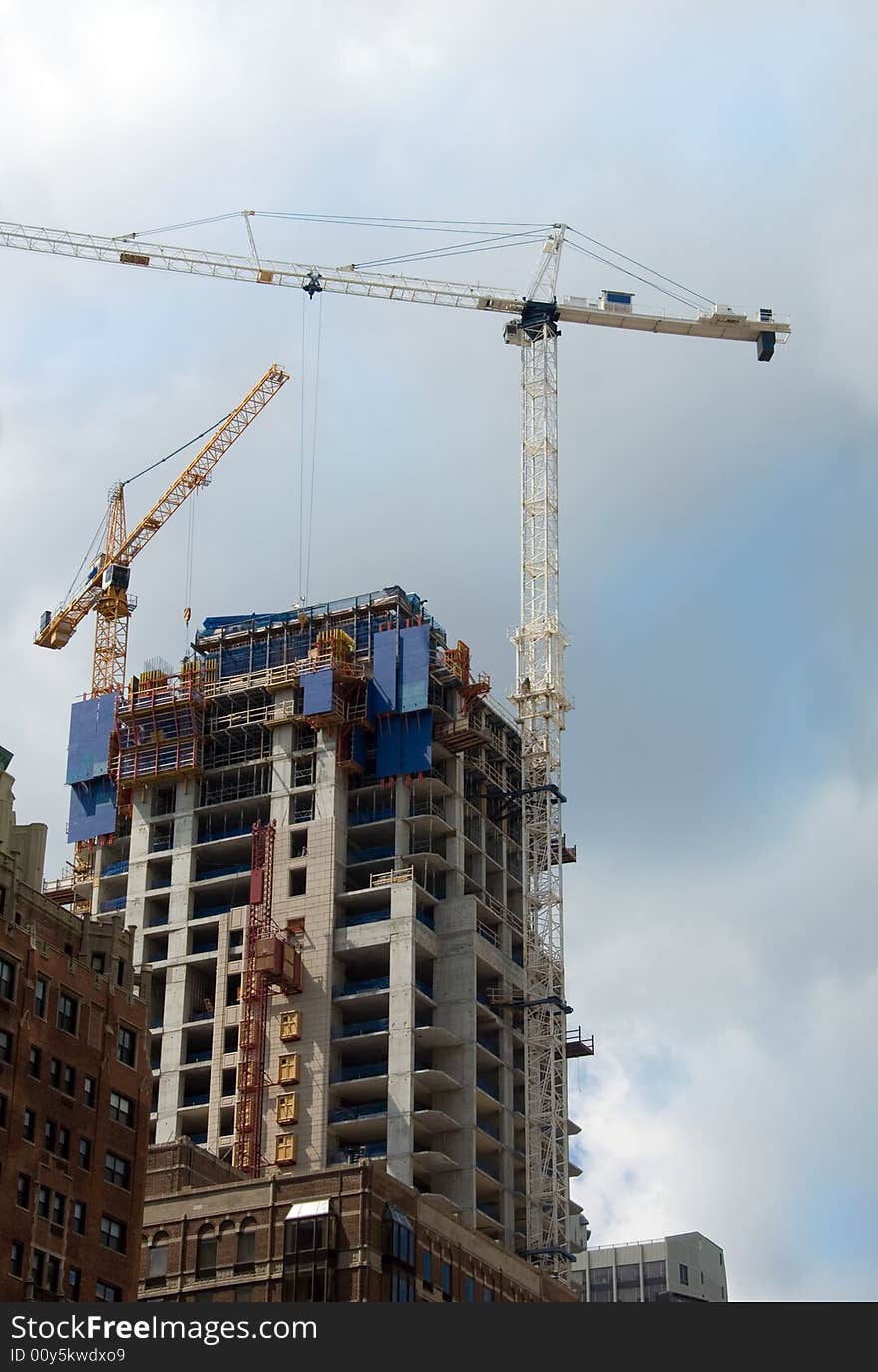 Construction Crane On Skyscraper