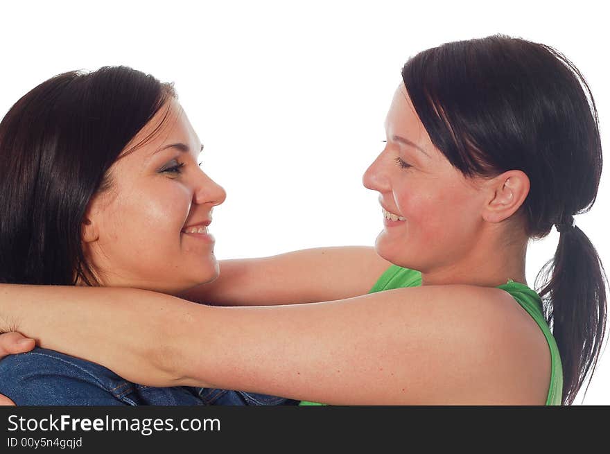 Two attractive women on white background. Two attractive women on white background