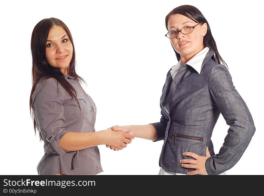 Two attractive businesswomen on white background. Two attractive businesswomen on white background