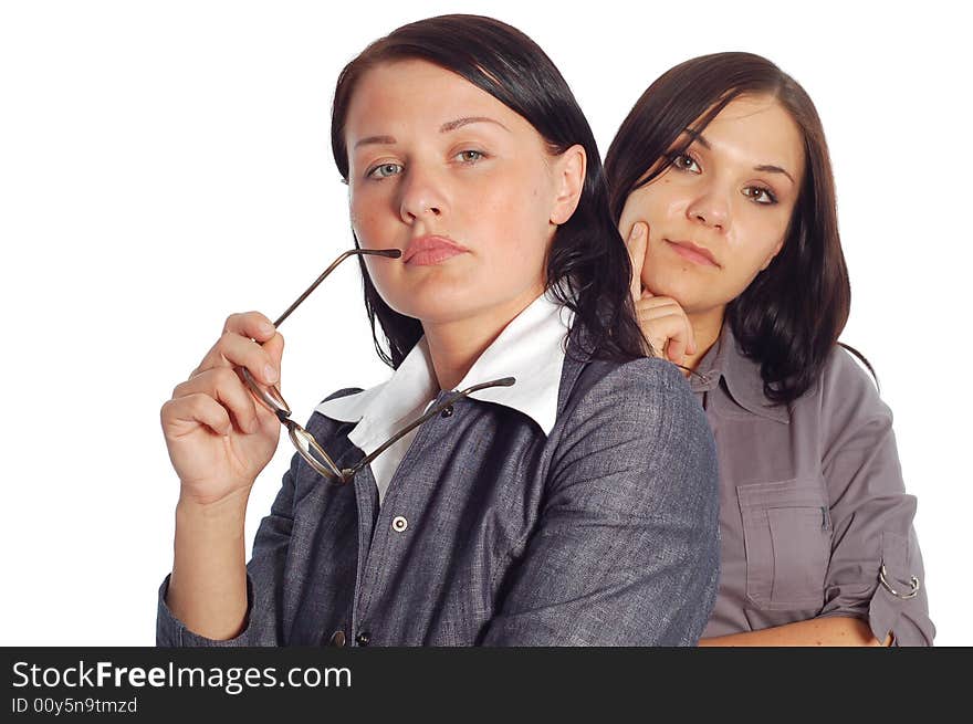 Two attractive businesswomen on white background. Two attractive businesswomen on white background