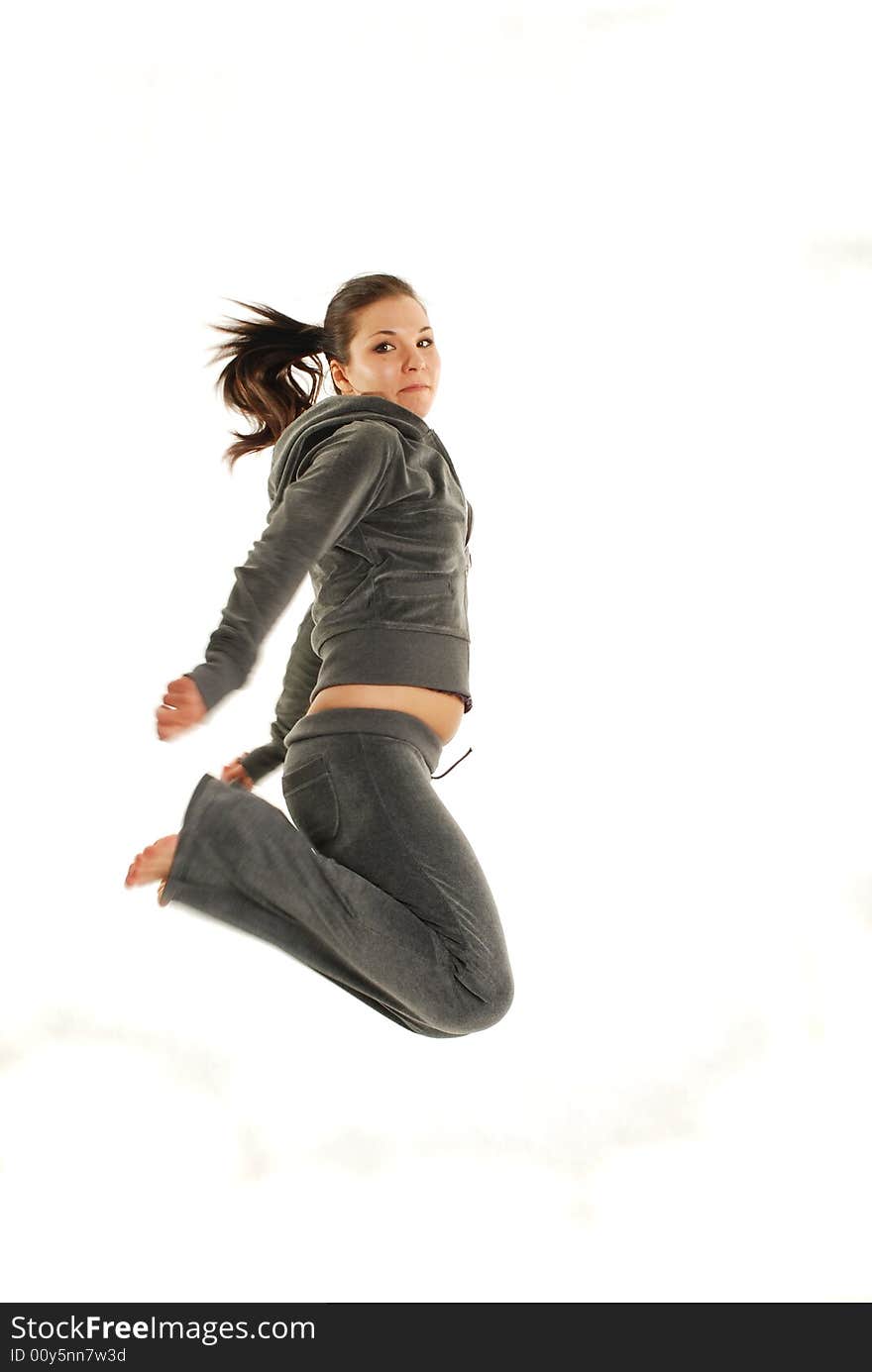 Active woman jumping on white background. Active woman jumping on white background