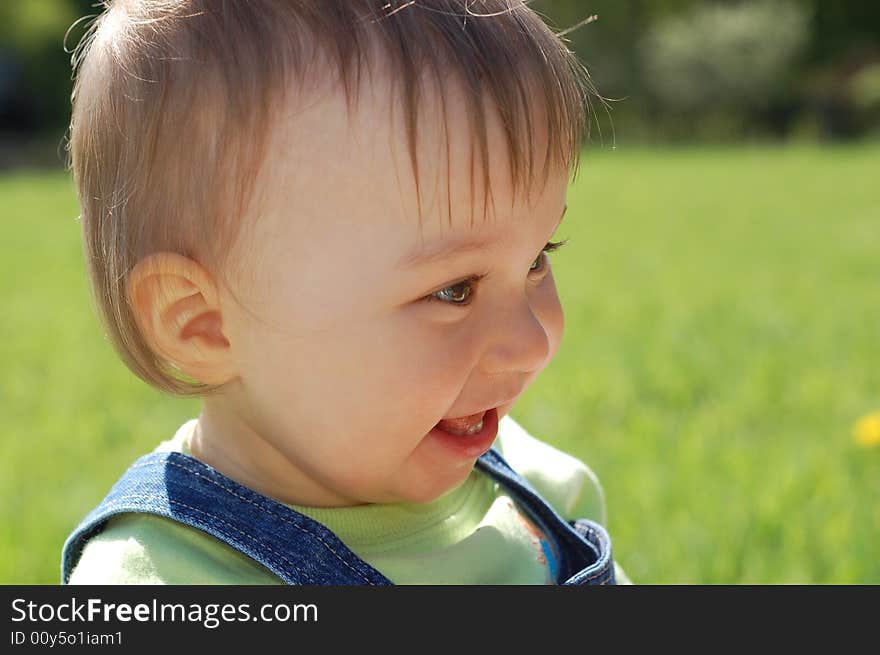 Happy child on green meadow. Happy child on green meadow