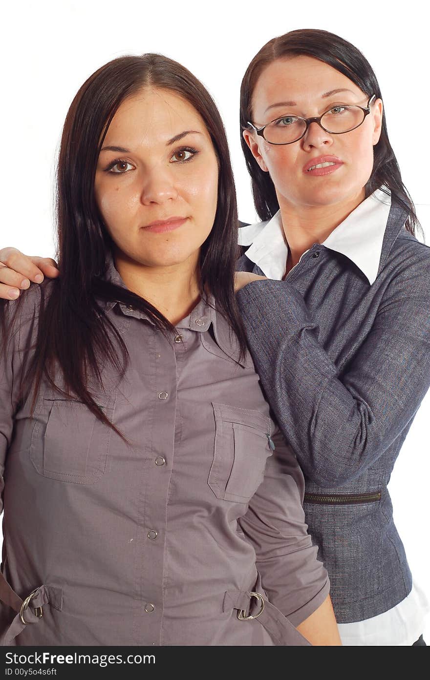 Two attractive businesswomen on white background. Two attractive businesswomen on white background