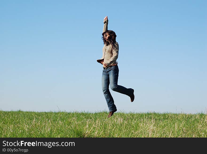 Attractive woman on sky background