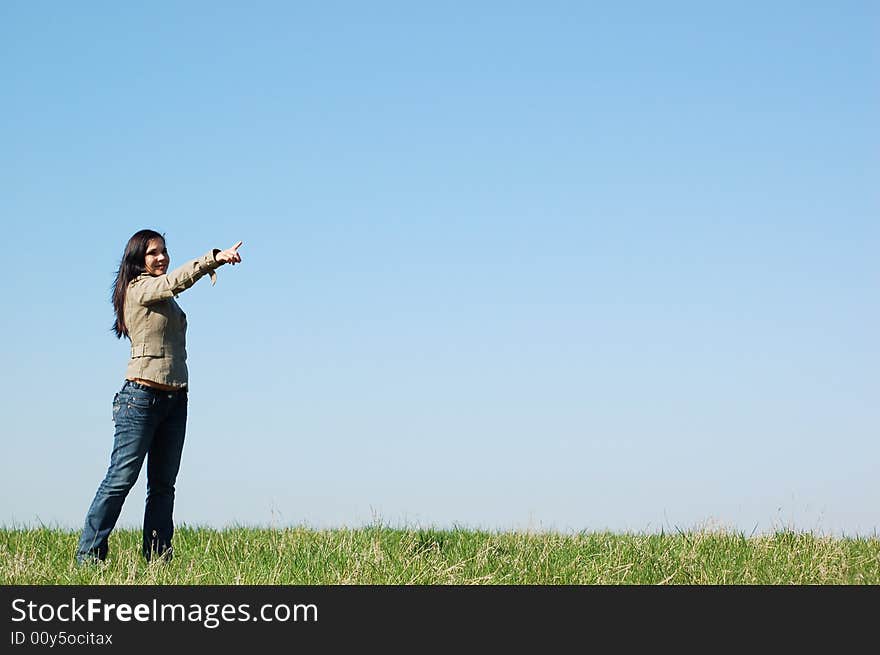 Attractive woman on sky background