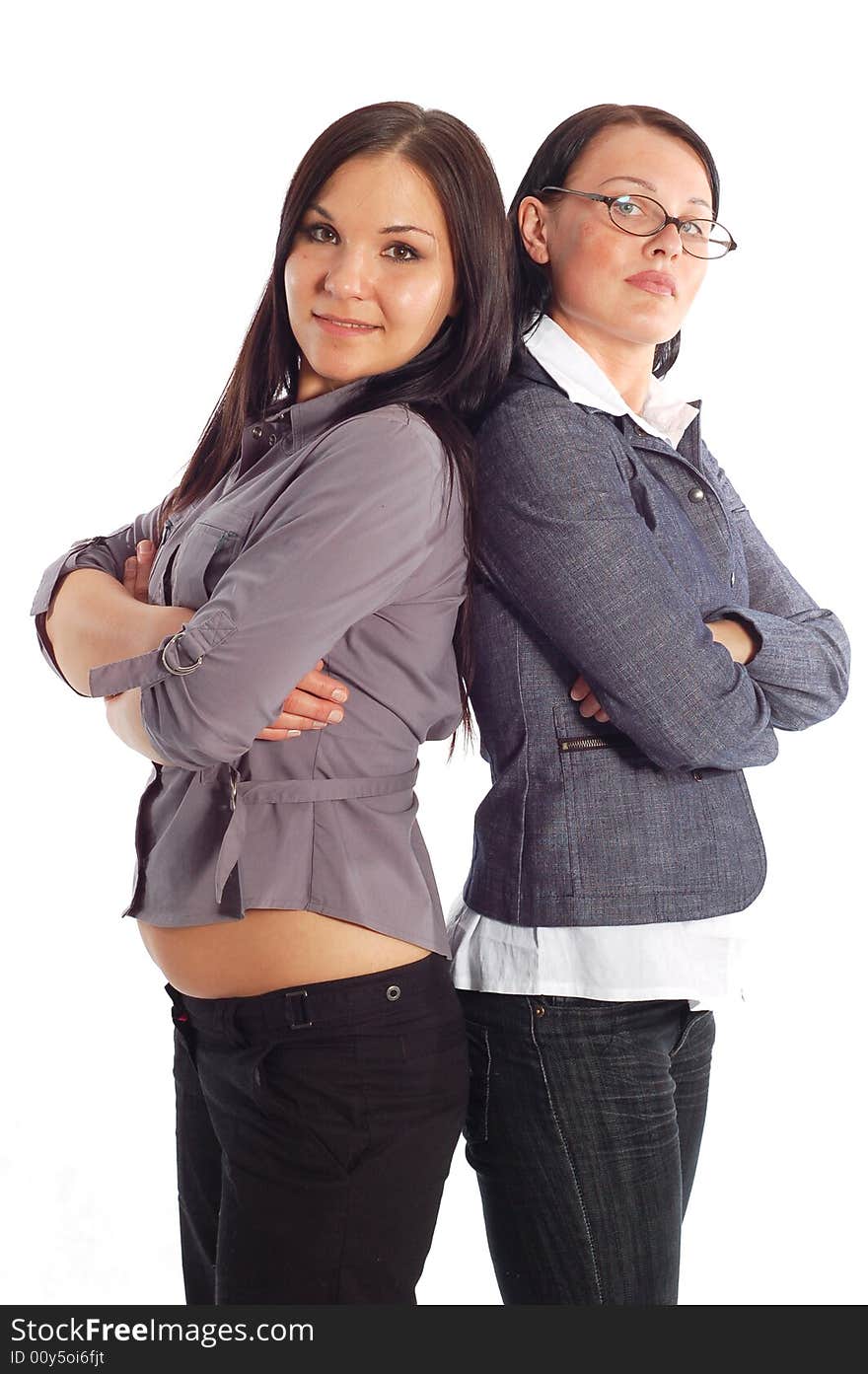 Two attractive businesswomen on white background. Two attractive businesswomen on white background