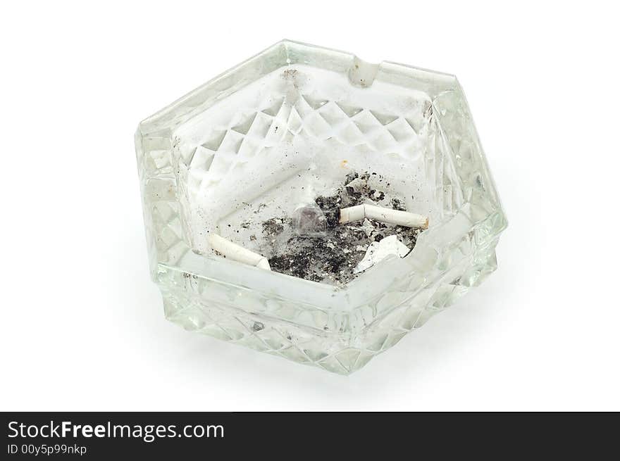 Glass ashtray on the white background. Glass ashtray on the white background.