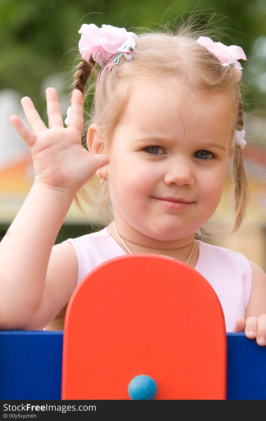 Happy little girl outdoor portrait