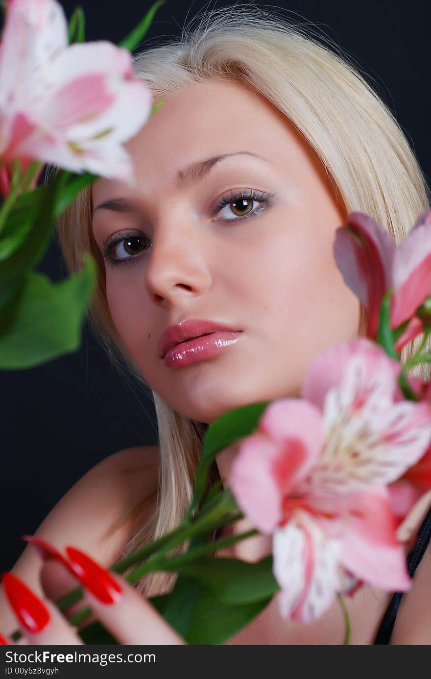 Woman with bunch of flowers