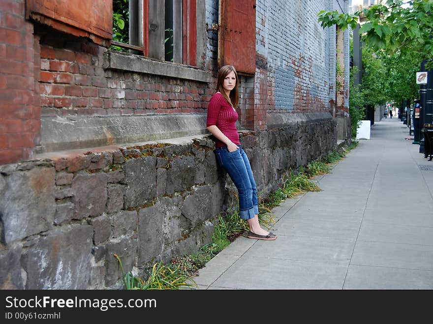 Teen Leaning Against Wall