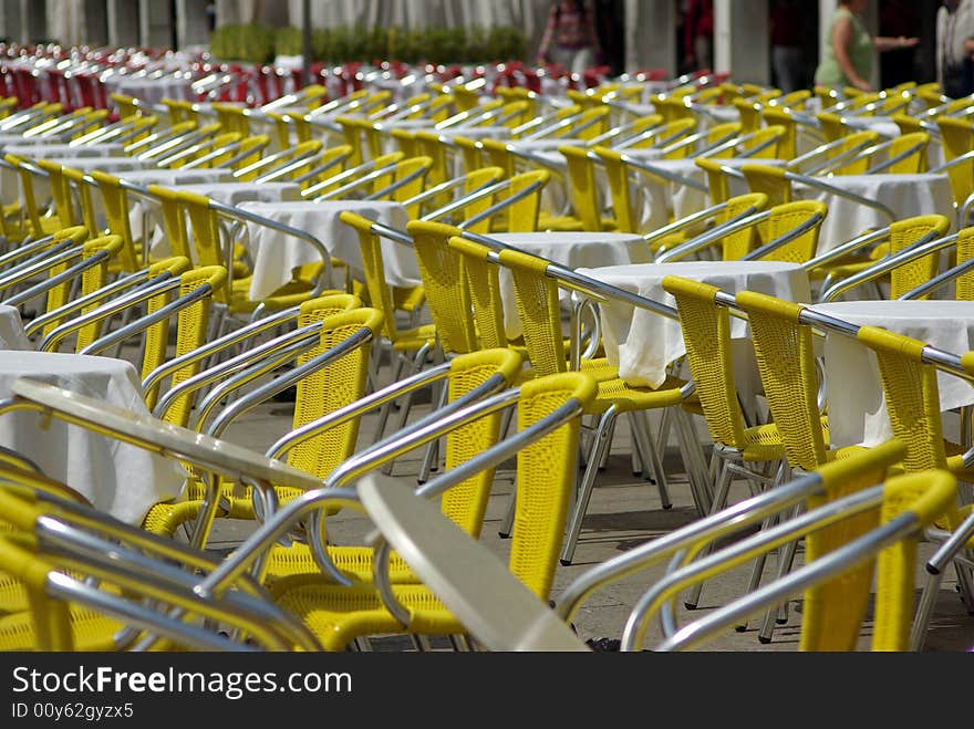 Yellow chairs in lines