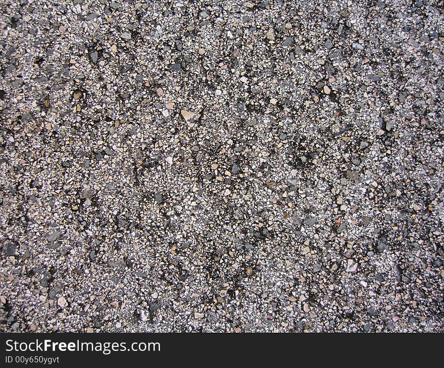 Close up view of asphalt from a road. Close up view of asphalt from a road.