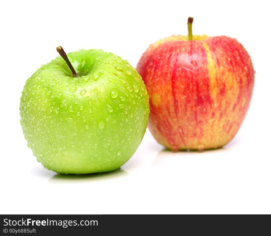 The ripe juicy apples on white. Isolation, shallow DOF. The ripe juicy apples on white. Isolation, shallow DOF.