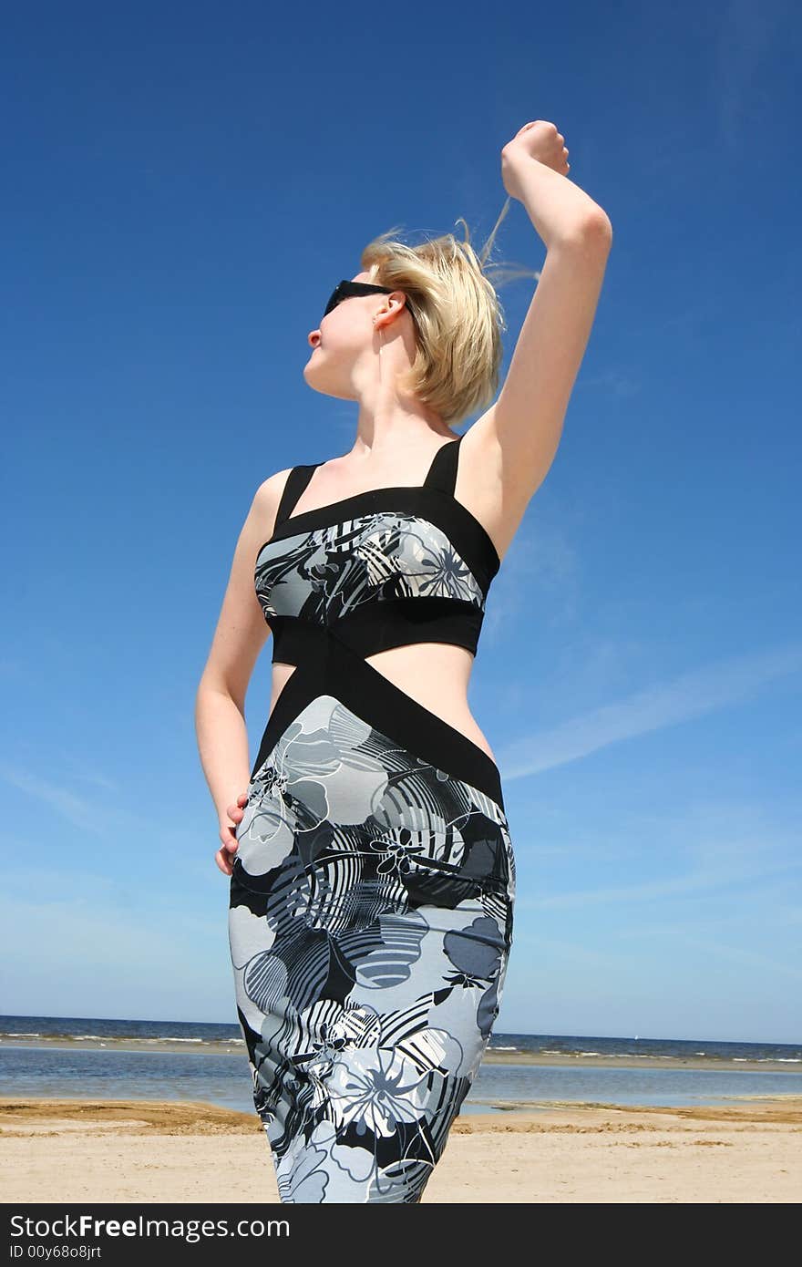 Beautiful young girl on the beach