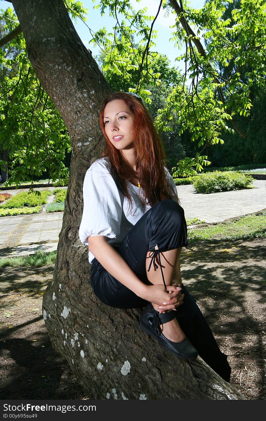 Young girl relaxing in park