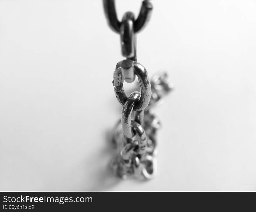 Links of chain on a white background