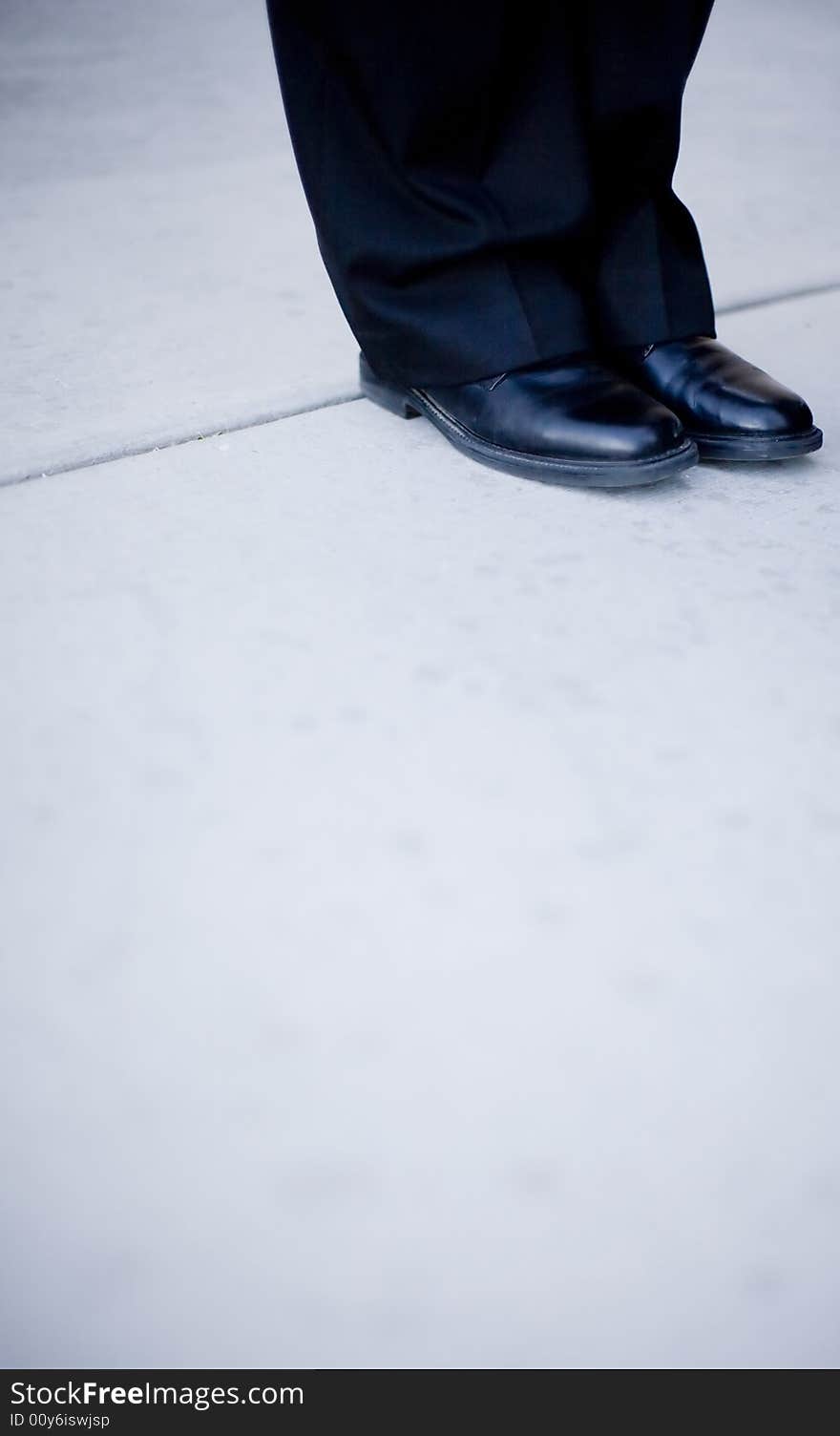 Close view shoes and pants of businessman. Close view shoes and pants of businessman