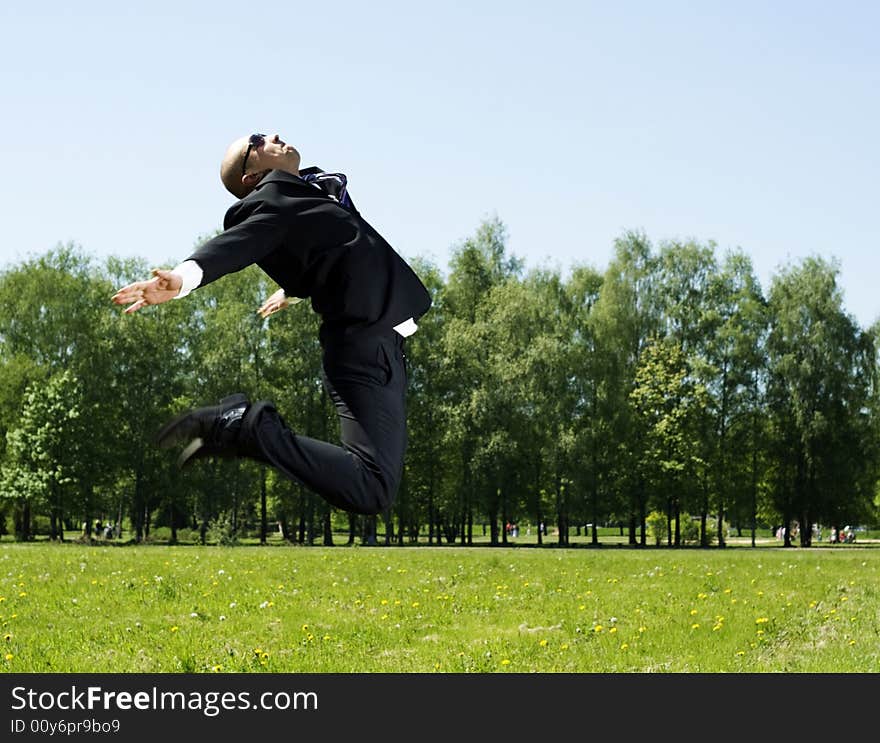 Businessman In The Park.