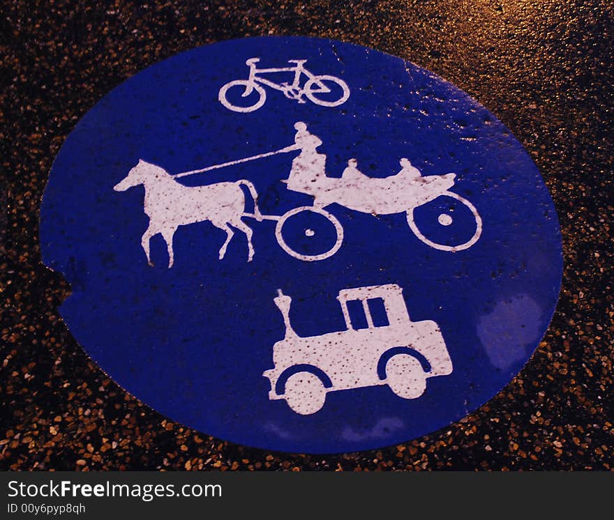 Sign painted on a wet street. Sign painted on a wet street