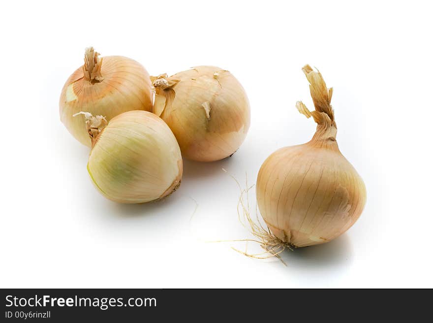 Group of onions isolated on white background