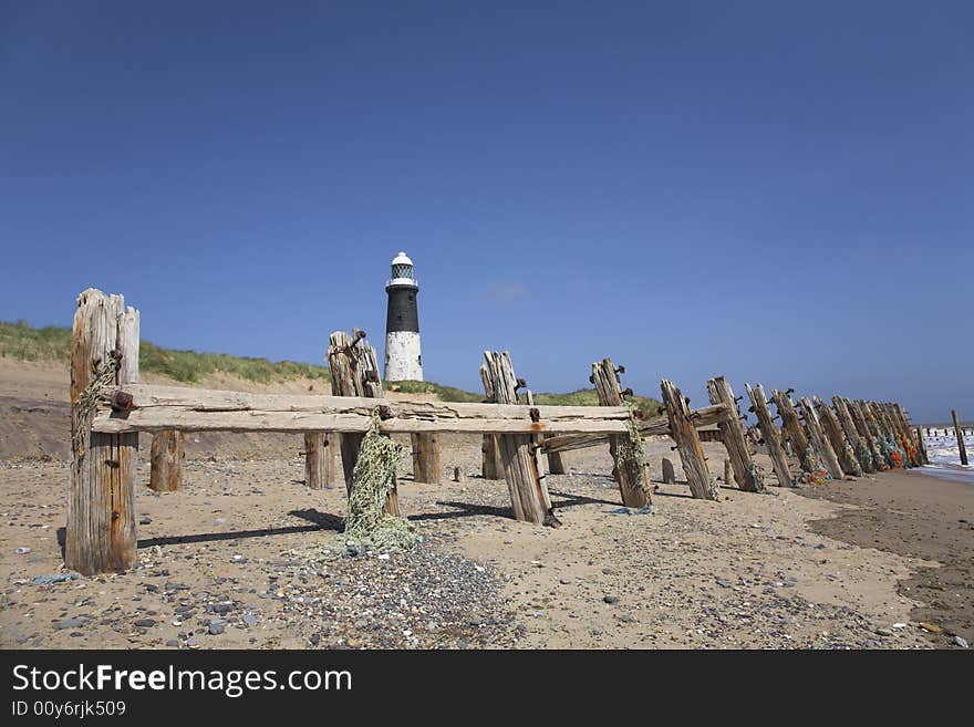 Black and white circular lighthouse at Spurn in East Yorkshire