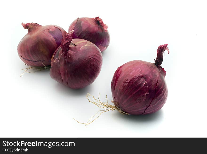 Group of purple onions isolated on white background. Group of purple onions isolated on white background