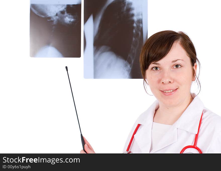 Young female doctor pointing at x-ray, isolated on white. Young female doctor pointing at x-ray, isolated on white