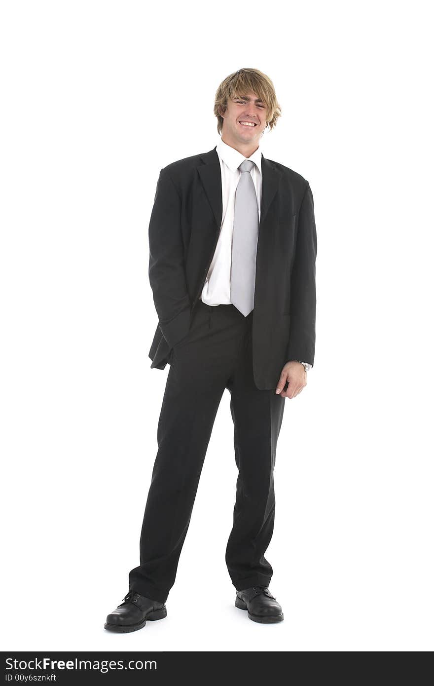 Portrait of a young businessman standing isolated on white