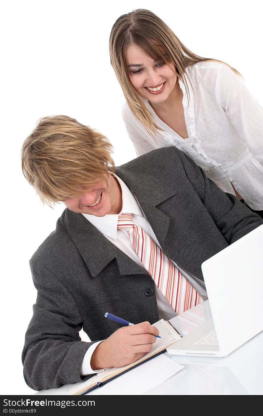 Business team working on the desk over white