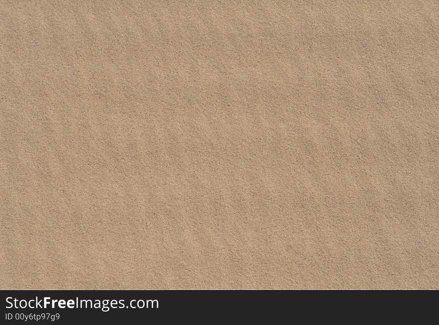 An up close image of a patterned sand dune. An up close image of a patterned sand dune