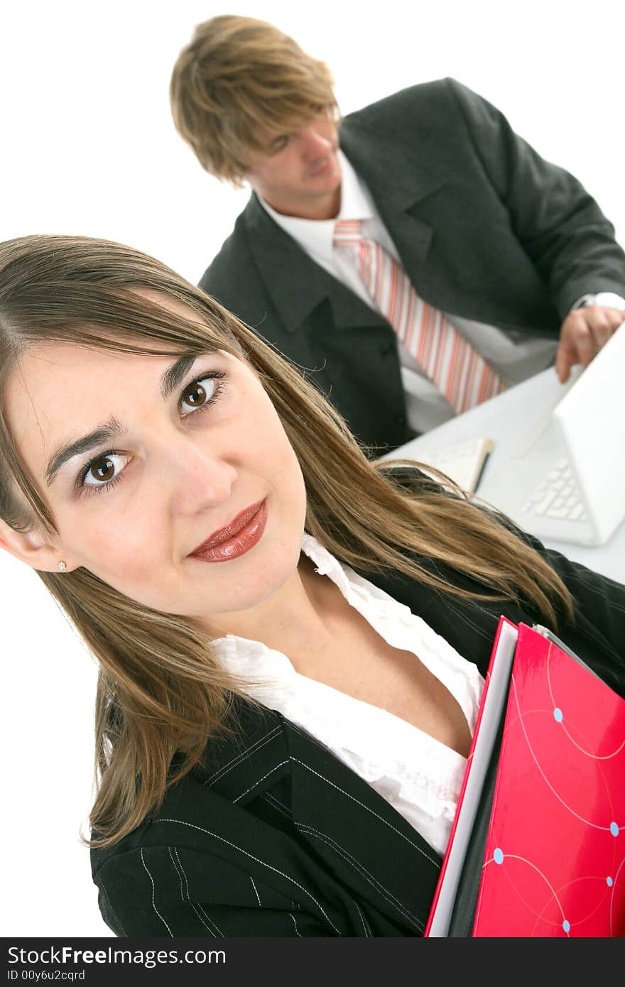 Business woman in an office environment isolated on white