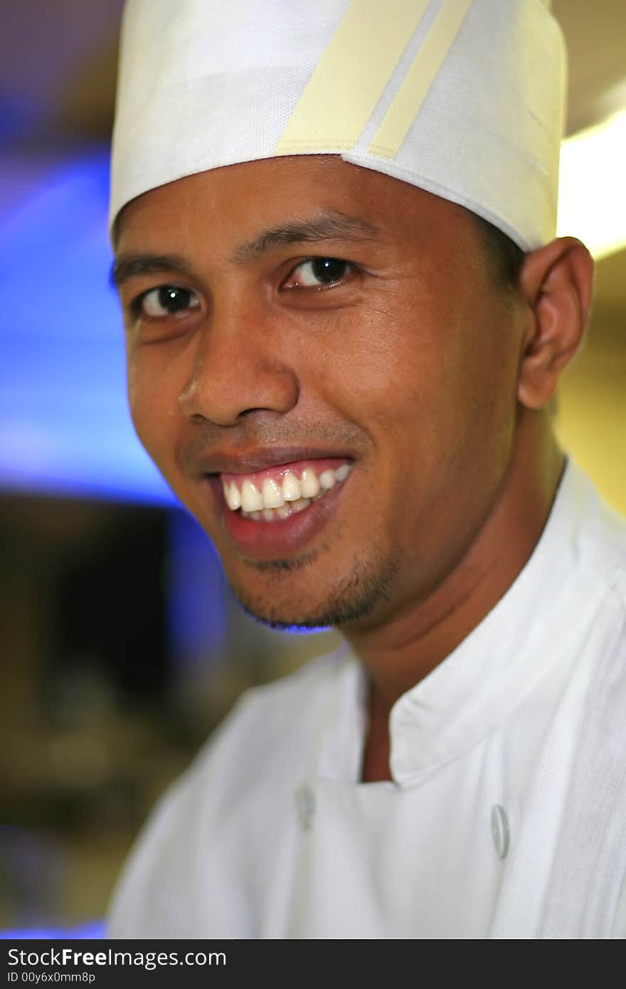 Photograph of asian chef close up