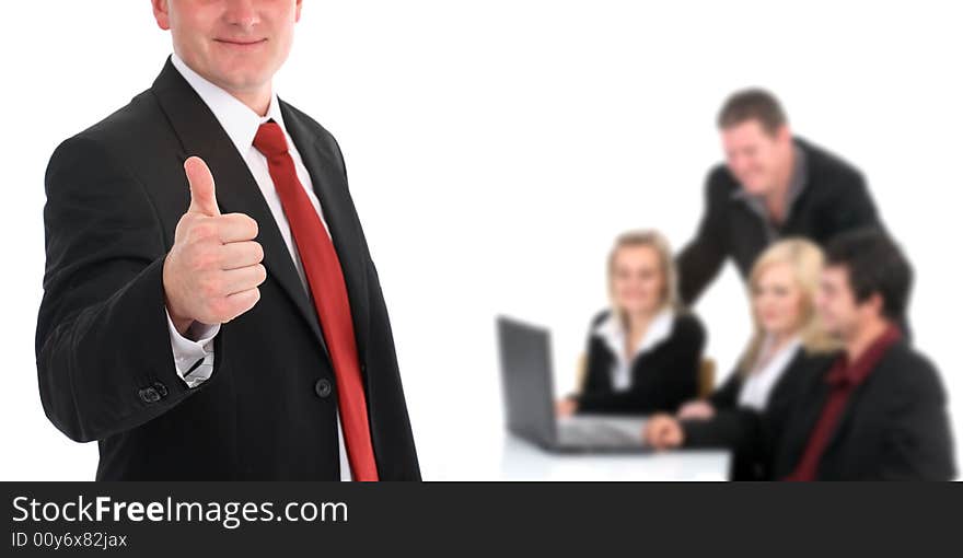 Portrait of a young attractive businessman giving the thumbs-up sign. Portrait of a young attractive businessman giving the thumbs-up sign.