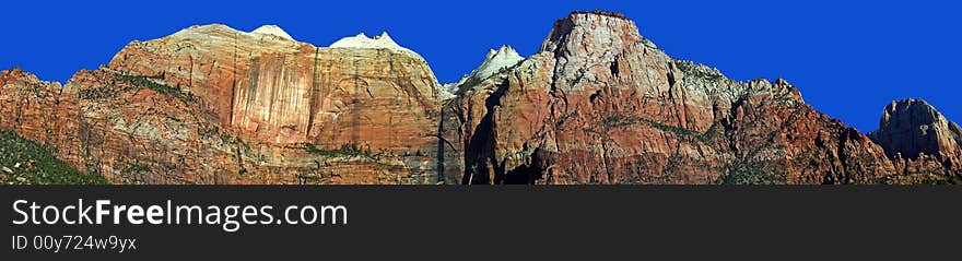 A panoramic view of the sandstone cliffs of Zion National Park, Utah.