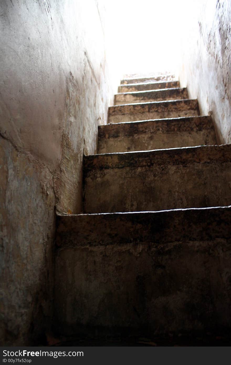 Ancient Stairs in Narrow Passageway