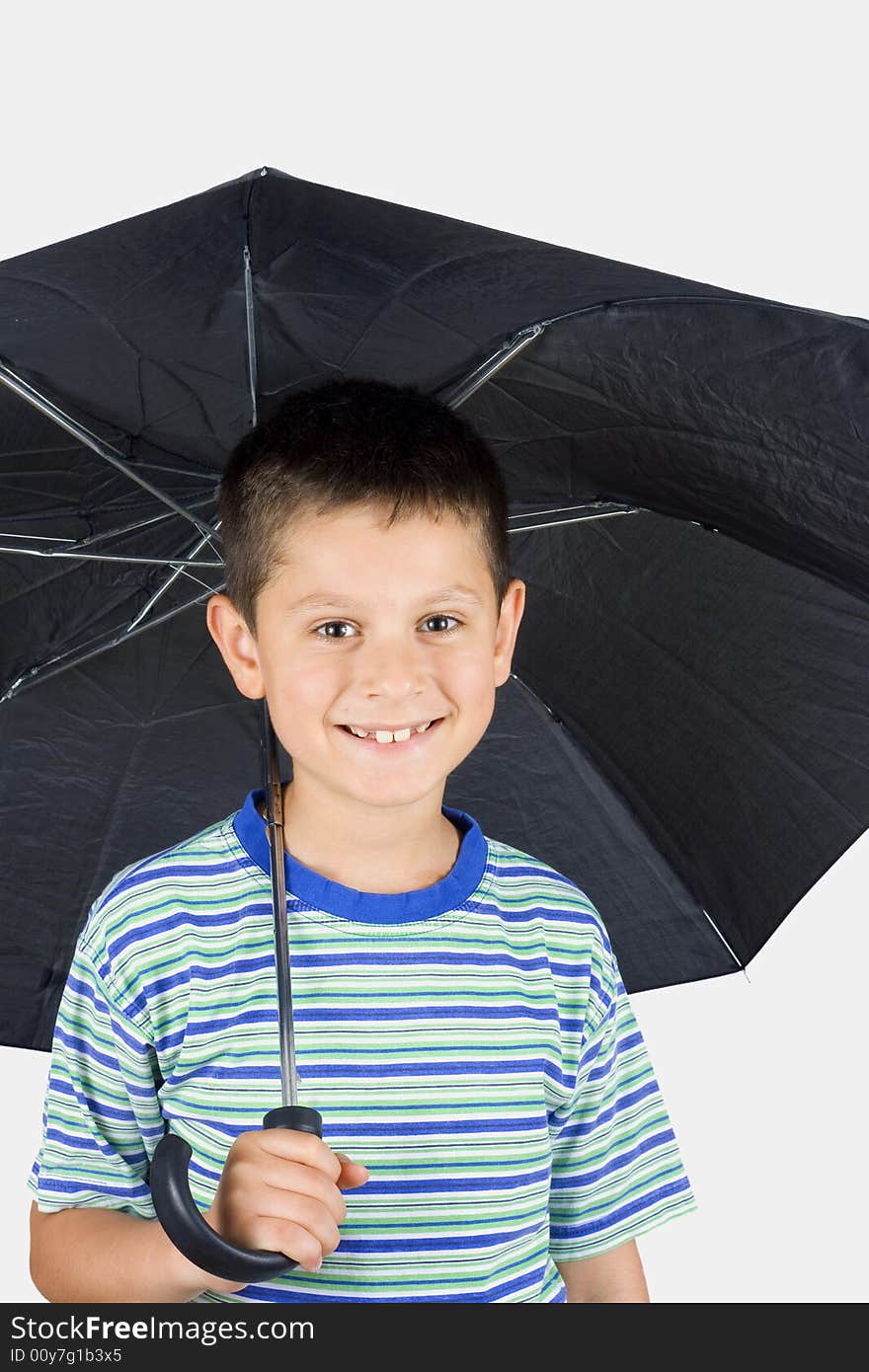 Young child under an umbrella on a white background. Young child under an umbrella on a white background