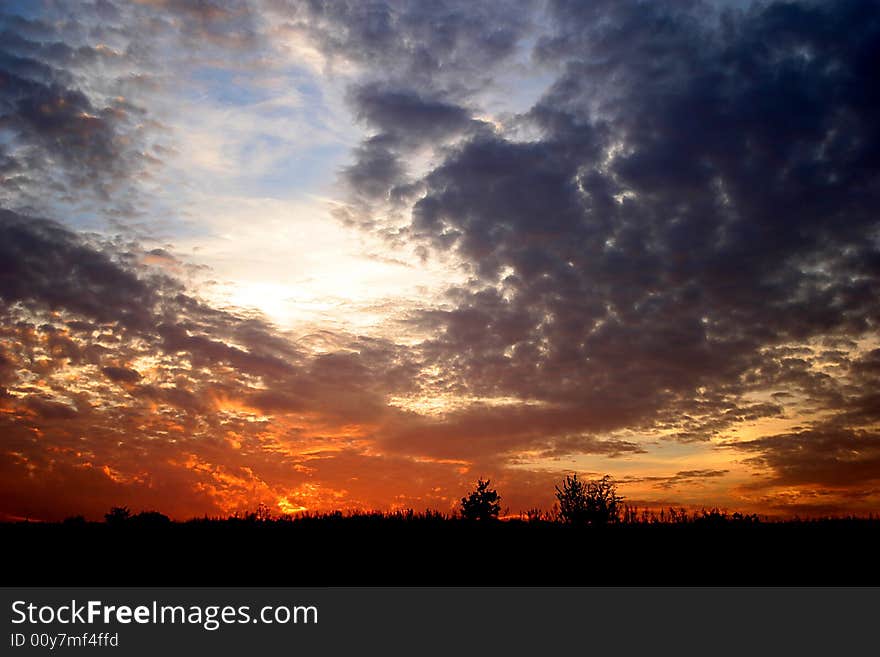 Photo of sunset over the field