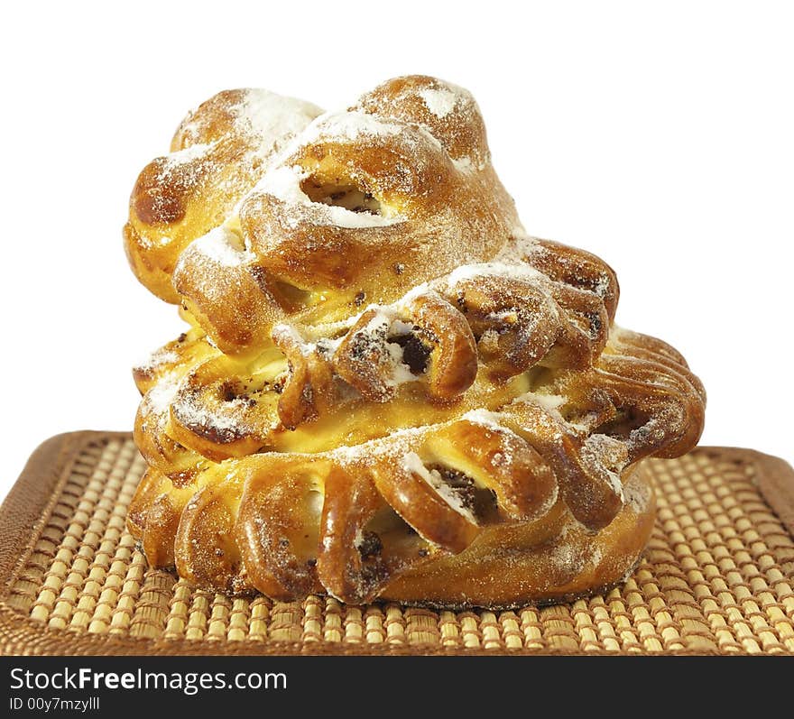 Sweet roll with raisin isolated on a white background