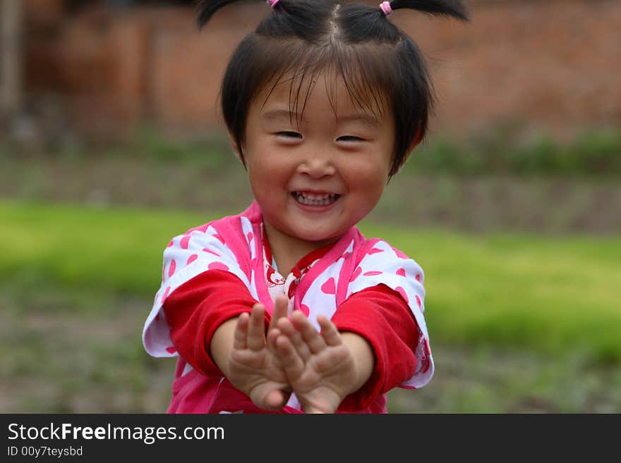 Cute little Chinese girl in summer