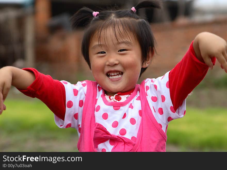 Cute little Chinese girl in summer