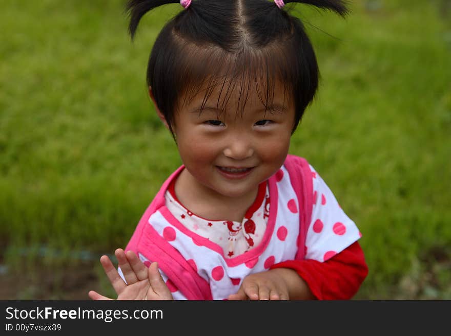 Cute little Chinese girl in summer