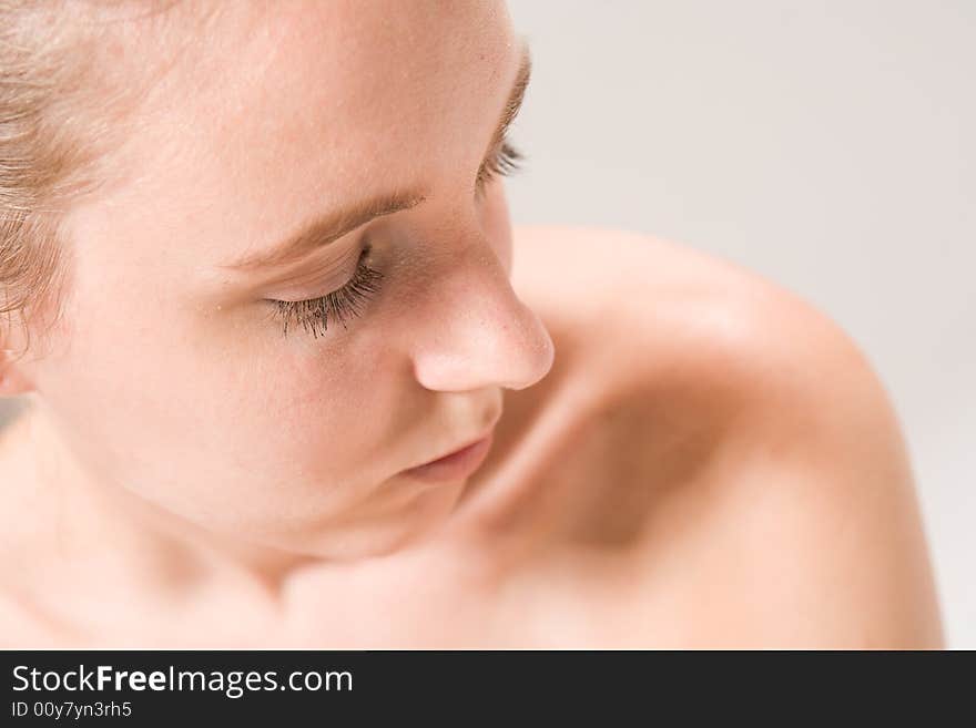 Studio close up portrait of a beautiful woman. Studio close up portrait of a beautiful woman