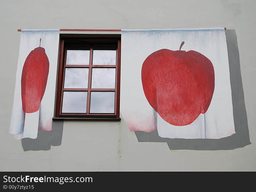 The window decorated with apples